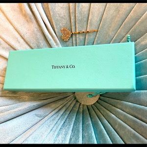 Authentic Tiffany and Co box and bag.